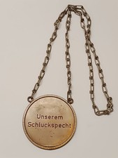 "UNSEREM SCHLUCKSPECHT" Medaille mit Kette für besondere Trinkfestigkeit.Messing
