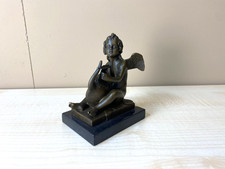 Bronzeskulptur Ein Putto spielt Leier nach Milo