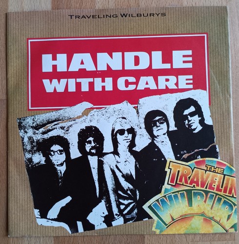Traveling wilburys handle - traveling,