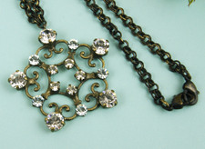 Konplott Kette bronze "Rosette" Swarovski Strasstein weiss neu