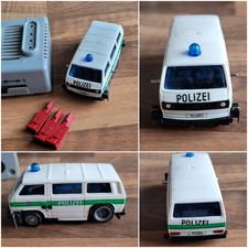 Carrera Servo 160 - Polizei Bus T3, Hindernisfahrzeug m. Adapter, 3 Umlenkfahnen