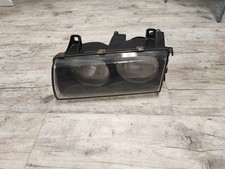 BMW 3er E36 BJ99 Scheinwerfer links Hella 14761300