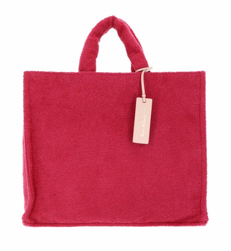 Coccinelle never without bag - never,