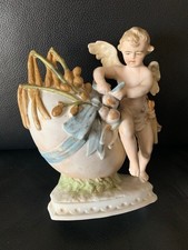 Alte Porzellanfigur Amor mit