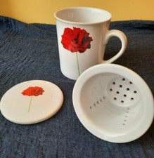 Teetasse mit Sieb und Deckel