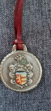 Reiseandenken aus Burhave,  Anhänger aus Metall am Lederband ( 50er/60er Jahre)