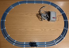 Lego 12V Transformator Trafo 7864 mit Schienen-Oval