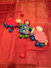 Kinderwagenkette Holz bunt Schafe und Schäfer