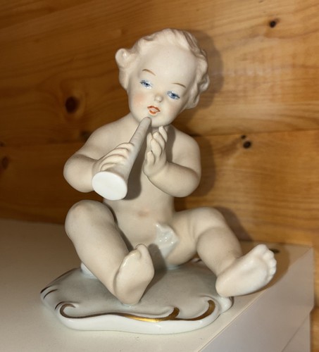 Porzellanfigur putte mit - putte,