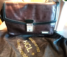 HCL Herren Handgelenktasche dunkles Braun mit HCL Logos + Original Textilbeutel