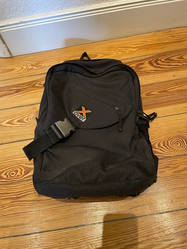 Xover over rucksack - x-over,