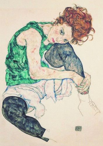 Puzzle sitzende frau - t.),