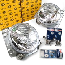 2x HELLA Hauptscheinwerfer