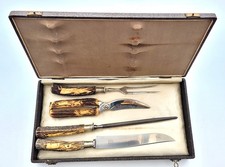Jagdbesteck, Solingen, Tranchierset, Griffe Hirschhorn mit Motiven