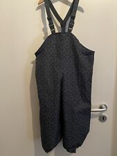 Regenhose+ Regenjacke mit dunkelblauen Tropfen