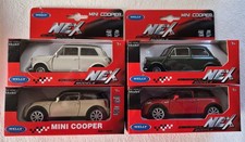 4  Modellautos Mini Cooper