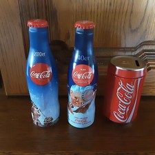 Coca-Cola 2 Konturflaschen ungeöffnet + Spardose