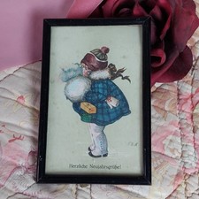 Postkarte Herzliche Neujahrswünsche , Mädchen in altem Stellrahmen