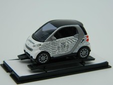 Der BUSCH 46125 Smart Fortwo Coupé 2007 "Polizei Luxemburg"