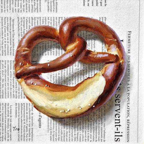 Eine brezel auf zeitung - eine,