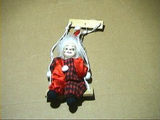Harlekinpuppe auf der - ,