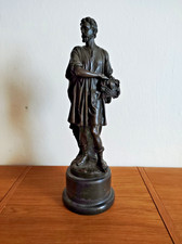 Bronze Figur Mann mit Obstkorb
