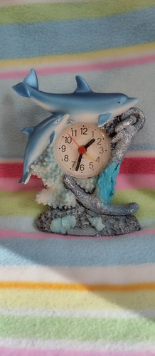 Uhr/Delphin
