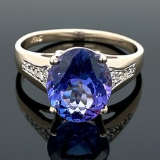 RING GR. 20(CA. 62) AUS 585/GELBGOLD MIT TANSANIT AAAAA & BRILLANTEN SCHMUCKJAGD