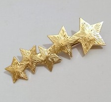 1 Haarspange Sterne goldf