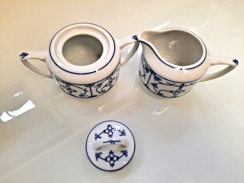 Zuckerdose und milchkännchen - und,