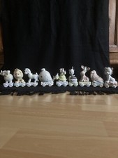 9 Porzellan Figuren ENESCO