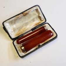 1 Paar Bernstein Zigaretten-/ Zigarrenspitzen im Etui, 19. Jhd. 6,5 cm       D53