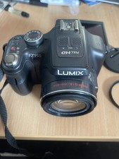 Panasonic LUMIX DMC-FZ150 12.1 MP Digitalkamera - Schwarz Leica Objektiv 24xZoom