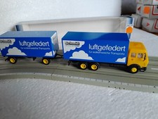 Herpa    LKW  1:87  Mercedes Benz   Kofferhängerzug     " Schmid "  luftgefedert