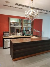 Gastronomie Kaffeeautomat mit Siebdruckträger der Marke Faema in türkis