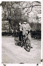 Foto Paar mit Tandem Fahrrad