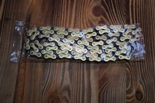 NOS Gold / Black Chain  . Regina extra . evererst . Shimano. Campagnolo