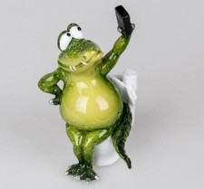 768339 Krokodil Figur auf WC