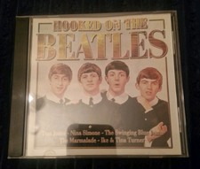 1x HOOKED ON THE BEATLES- CD