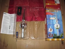 Tannenbaumspitze mit Licht