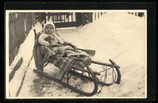 Foto-AK Baby im Schlitten 