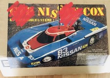 Modellauto GP Nissan Cox, Mit