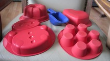 Tupperware 4 Backformen Silikon  und 3 Schütten - Herz - Schneemann - Rodonform