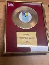 Uk gold disc award , genuine
