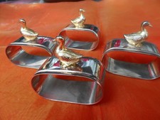 4 er Set, silbrige Serviettenringe mit einer goldenen Ente, Vintage