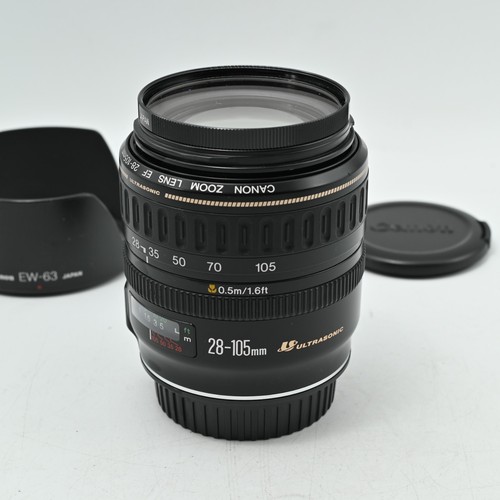 Near mint canon 28 135mm - mint],