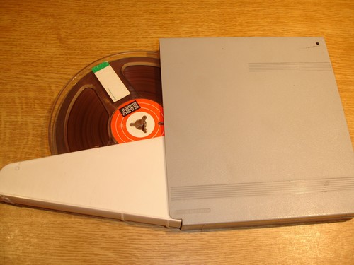 Tonbandspule 15cm band u - m.,