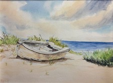 Ostsee Boot in den Dünen an