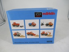 Märklin Spur H0 18310 Mehrzweckfahrzeug "Unimog" mit 6-teiligem Zubehör in OVP