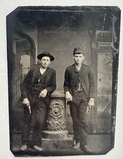 Young Men Holding Gun Pistol